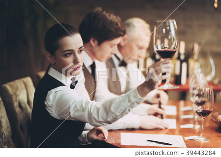 Group of sommeliers make wine card in restaurant Group of sommeliers make wine card in restaurant 39443284