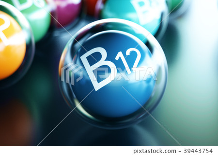 Vitamin B12, on black background. Symbol of health Vitamin B12, on black background. Symbol of health 39443754