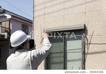 Housing and helmet man field work pointing finger tablet 39444386