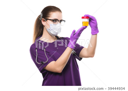 Attractive caucasian female doctor holding urine Attractive caucasian female doctor holding urine 39444934