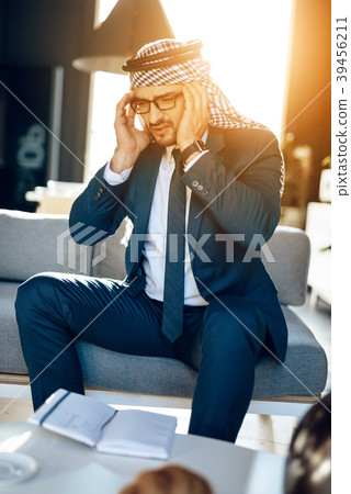 Stressed arab businessman 39456211
