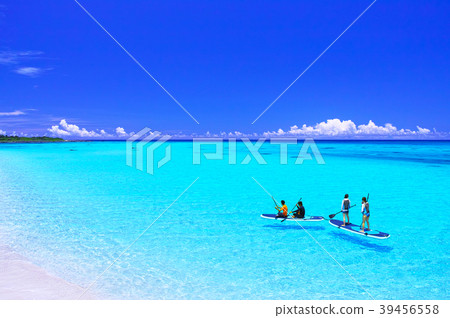 People enjoying marine sports in the beautiful sea that extends along Miyakojima and Shimo Airport in midsummer 39456558