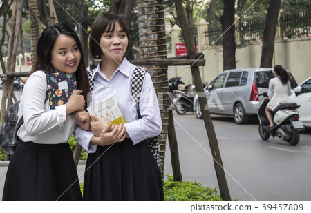 two students are looking at the street creepy two students are looking at the street creepy 39457809