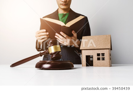 Real estate insurance lawyer working hard. 39458439