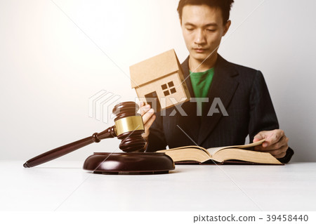 Real estate insurance lawyer working hard. 39458440