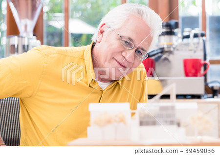 Asian architect studying an innovative residential 39459036