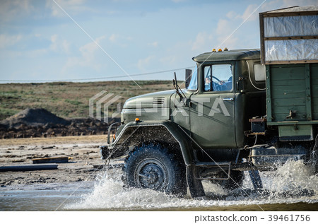 Off-road truck whith wheels tires in mud and water Off-road truck whith wheels tires in mud and water 39461756
