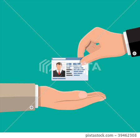Businessman hand gives business card. 39462308