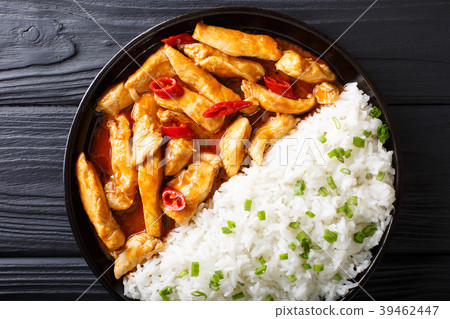chicken panang curry with garnish of rice 39462447
