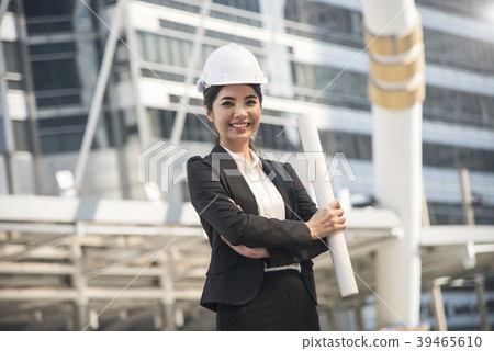 businesswoman engineer with construction drawing businesswoman engineer with construction drawing 39465610
