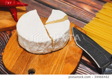 Sliced soft cheese ready to cooking Sliced soft cheese ready to cooking 39466482
