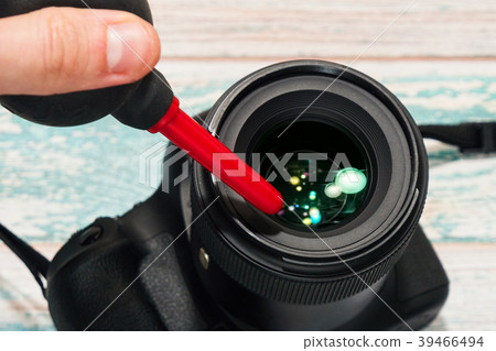 Taking care of photographic lens 39466494