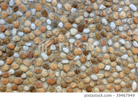 background made of a closeup of a wall with pebble 39467949