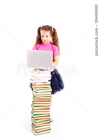 Cute girl with notebook on books Cute girl with notebook on books 39469980
