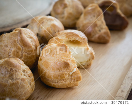 cream puff or profiterole or choux cream cream puff or profiterole or choux cream 39470171