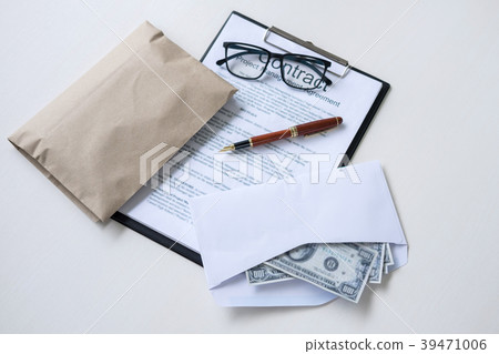 Bribery and corruption concept, bribe in the form of dollar bill 39471006