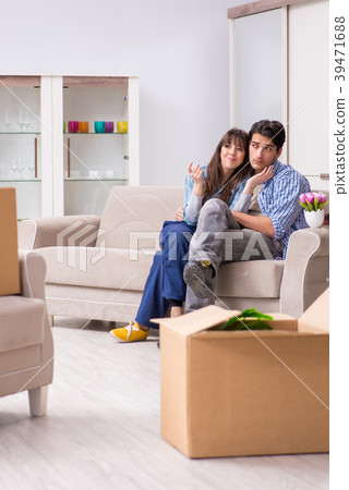 Young family moving in to new apartment after 39471688