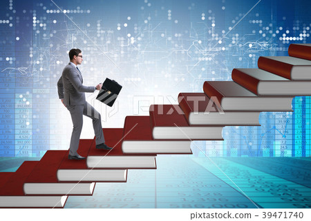 Businessman student climbing the ladder of 39471740