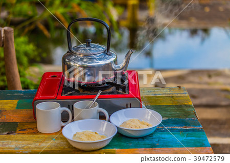 egg porridge and hot coffee 39472579