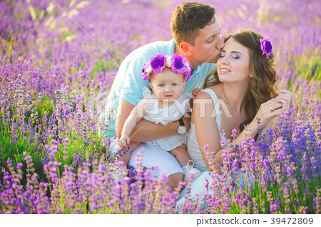 Young family in a lavender field Young family in a lavender field 39472809