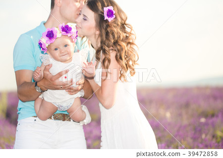 Young family in a lavender field Young family in a lavender field 39472858