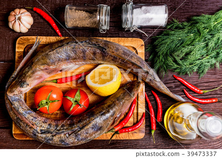 Fresh zander wilt lemon, pepper and spices close Fresh zander wilt lemon, pepper and spices close 39473337