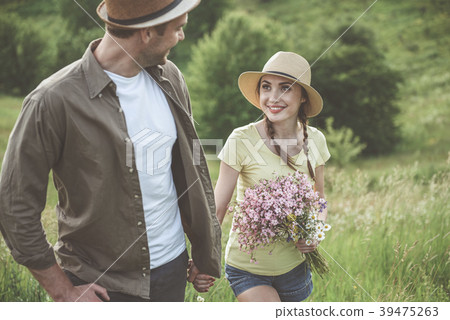 Happy young man and woman are spending time 39475263