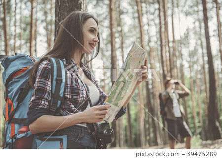 Positive young travelers are scaling the Positive young travelers are scaling the 39475289