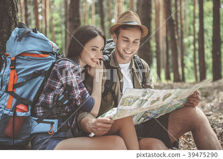 Inspired tourists preparing for journey Inspired tourists preparing for journey 39475290