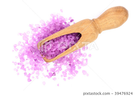 Violet sea salt in wooden scoop isolated on white Violet sea salt in wooden scoop isolated on white 39476924