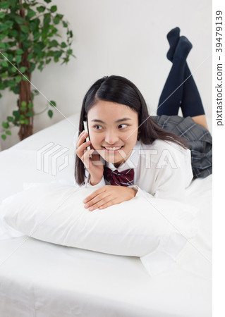 Uniform high school student bedroom morning Uniform high school student bedroom morning 39479139