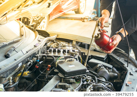 man with engine on car service blurry background man with engine on car service blurry background 39479255