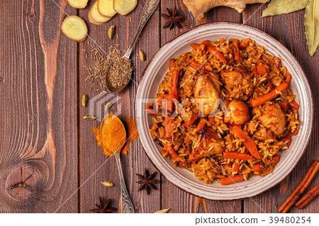 Pilaf (biryani) on a wooden background 39480254