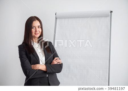 Portrait of young smiling businesswoman standing Portrait of young smiling businesswoman standing 39481197