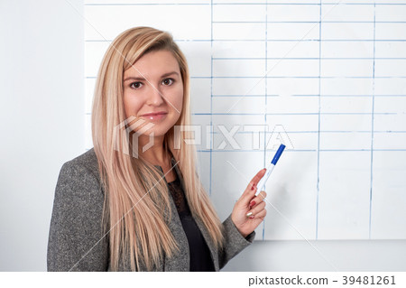 Portrait of young smiling businesswoman standing Portrait of young smiling businesswoman standing 39481261