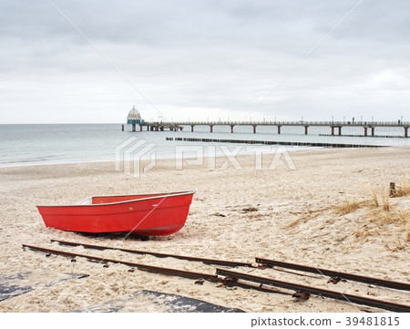 New red laminate ship  on offshore of the beach 39481815