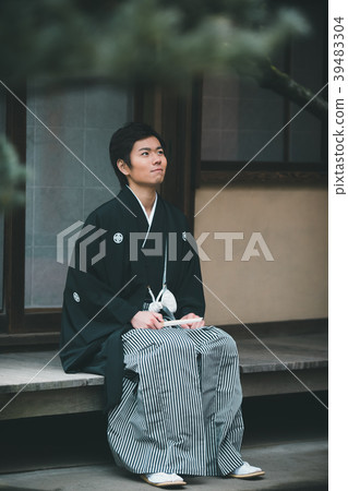 haori with a family crest, hakama with family crest, person 39483304