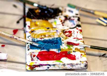 Close up of painting stuff and brushes Close up of painting stuff and brushes 39488545