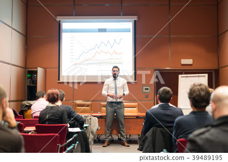 Skiled Public Speaker Giving a Talk at Business Skiled Public Speaker Giving a Talk at Business 39489195