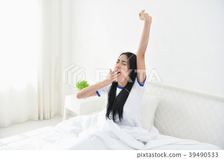Lifestyle Concept. Cute Asian girl in night dress. Beautiful asi Lifestyle Concept. Cute Asian girl in night dress. Beautiful asi 39490533