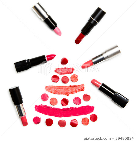 Lipstick on white background top view 39490854