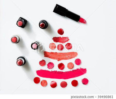 Lipstick on white background top view 39490861