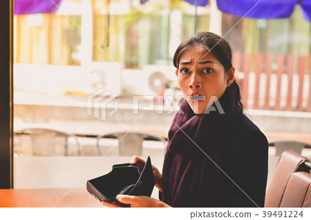 Bankrupt Business Concepts. Beautiful businesswoman was shocked Bankrupt Business Concepts. Beautiful businesswoman was shocked 39491224