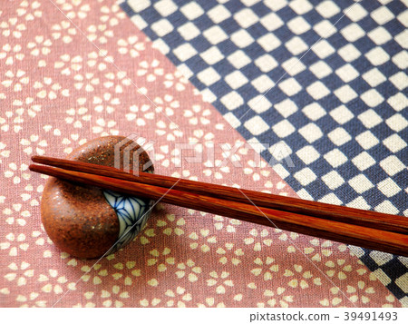 Chopsticks and chopstick rest and Japanese paper Chopsticks and chopstick rest and Japanese paper 39491493