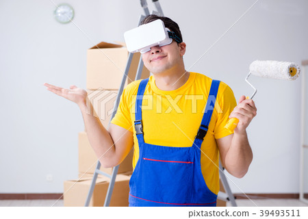 Painter contractor working with virtual reality Painter contractor working with virtual reality 39493511