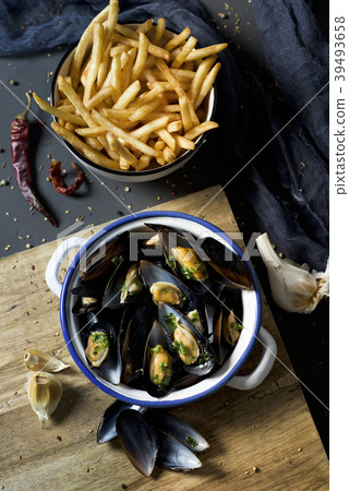 moules-frites, typical Belgian mussels and fries. moules-frites, typical Belgian mussels and fries. 39493658