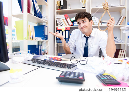 Busy frustrated businessman angry in the office Busy frustrated businessman angry in the office 39494585