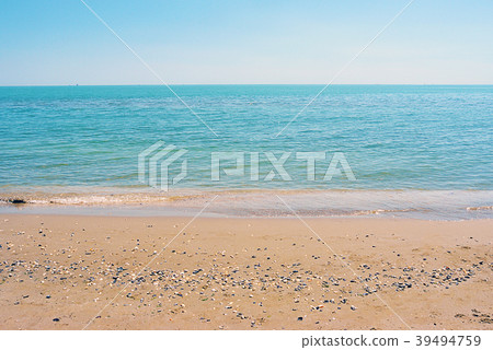 Empty sand beach background. Horizon with sky and 39494759