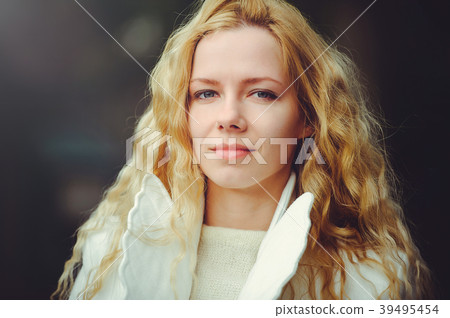 Outdoor fashion photo of a beautiful young  39495454