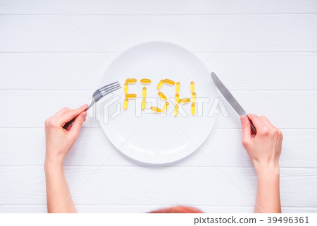 Fish word lettering by cod Liver Oil Capsules 39496361